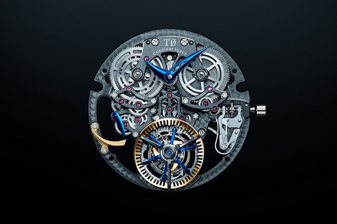 The Grand Seiko T0 Constant Force Tourbillon movement out of any case, a gold toothed outer carriage encircling a blued spoked inner carriage at six, engraved T0 Constant Force and 43 Jewels