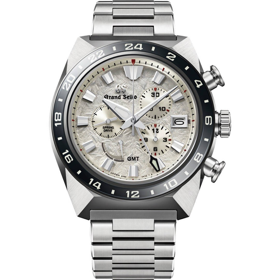 A Grand Seiko SBGC253 Spring Drive chronograph in a broad angular case, its textured off white dial carrying three subdials, with a pusher above and below the crown