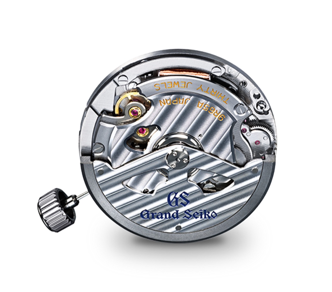 The Spring Drive Caliber 9R65 out of its case, a copper generator coil near the top edge, a broad striped surface carrying the Grand Seiko signature, and gold engraving reading 9R65A JAPAN THIRTY JEWELS